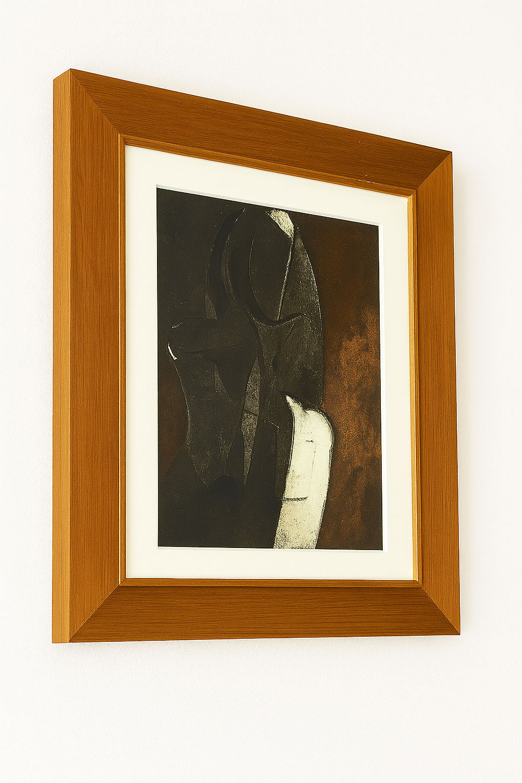 Mid century abstract monotype with dark layered forms, earthy brown and off-white highlights, in vintage wooden frame with off-white mount.
