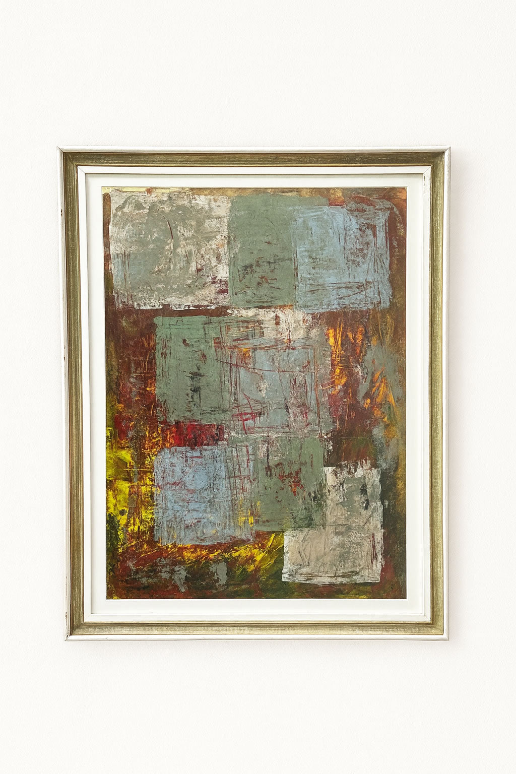 Cubist abstract acrylic painting with layered greens, blues, and greys over textured reds and yellows, framed in period  painted frame.